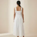 Women's crisp white Korean parachute style maxi dress featuring adjustable square neckline and utility cargo pockets (2)
