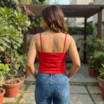 Women's red sweetheart neck cami top with gold rose brooch (4)