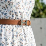 Women's tan leather fashion belt featuring a polished silver H style buckle (4)
