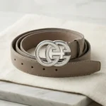 Women’s taupe leather belt with interlocking silver double G buckle (1)