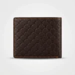 Dark brown Bomshisky men's bifold wallet featuring an embossed B pattern and contrast orange stitching (3)