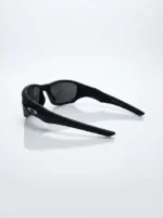 Oakley men's matte black rectangular sports sunglasses with dark grey lenses on a leather case (5)