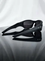 Oakley men's matte black rectangular sports sunglasses with dark grey lenses on a leather case (6)