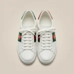 Pair of premium white leather luxury sneakers with green and red stripe (1)