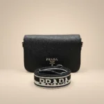 Prada Black Pebbled Leather Crossbody Bag with White Logo Webbing Strap (4)