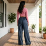 Woman in solid slate blue wide leg pants with matte texture (1)