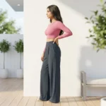 Woman in solid slate blue wide leg pants with matte texture (4)