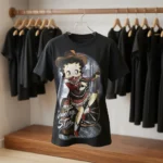 Woman wearing a black oversized t shirt with a vintage country star graphic print (2)