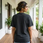 Woman wearing a black oversized t shirt with a vintage country star graphic print (3)