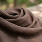 Woman wearing a brown two piece V neck maxi dress and matching shirt (6)