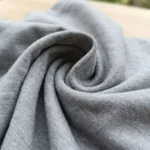 Woman wearing a grey oversized graphic print t shirt (4)