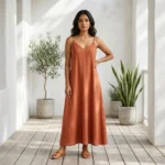 Woman wearing a rust matching co ord set with slip dress and overshirt (1)
