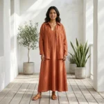 Woman wearing a rust matching co ord set with slip dress and overshirt (4)