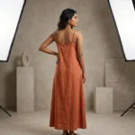 Woman wearing a rust matching co ord set with slip dress and overshirt (6)