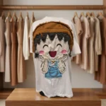 Woman wearing a white oversized t shirt with a cartoon patchwork design (2)