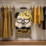 Woman wearing beige oversized leopard print t shirt with graphic patch (5)