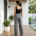 Women wearing grey ribbed full length wide leg pants with sparkles (1)