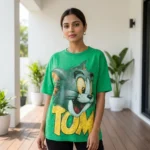 Womens green oversized t shirt with Tom cartoon graphic print in front (1)