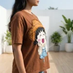 Women's oversized brown t shirt with large fabric character patch on front (3)