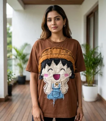 Women's oversized brown t shirt with large fabric character patch on front (4)