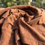 Women's oversized brown t shirt with large fabric character patch on front (5)
