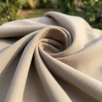 Women's solid beige high waist wide leg trousers smooth texture (1)