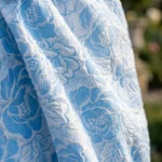 light blue and white floral jacquard midi dress with ruffle sleeves and a V neckline (4)