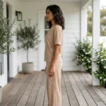 woman in a relaxed beige ribbed matching top and wide leg trousers (1)