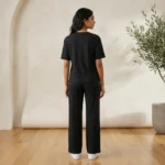 woman in a relaxed black ribbed matching top and wide leg trousers (2)