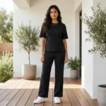 woman in a relaxed black ribbed matching top and wide leg trousers (3)