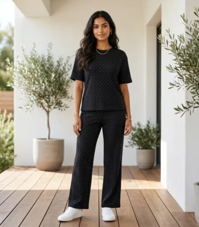 woman in a relaxed black ribbed matching top and wide leg trousers (3)
