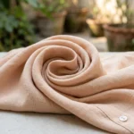 woman wearing a light beige two piece maxi slip dress with a matching open long sleeve shirt (7)