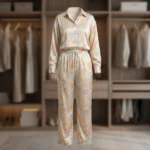 Indian woman wearing a pastel floral printed co ord set with tucked in full sleeve shirt and wide leg trouser (2)