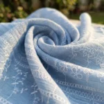 Light blue floral embroidered long sleeve women's shirt front view (2)