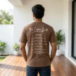 Man and woman wearing a relaxed fit unisex brown t shirt with a small white ice coffee chest print (6)