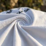 Man and woman wearing a white regular fit unisex t shirt (2)