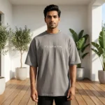 Man and woman wearing matching oversized grey unisex t shirts (3)