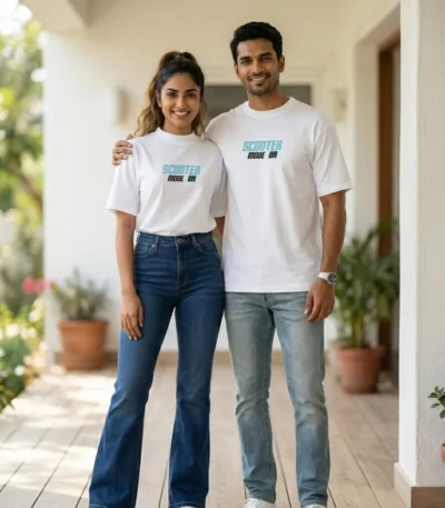 Man and woman wearing matching white Scooter Mode On graphic t shirts (1)
