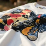 Off white women's oversized t shirt with colorful girl graphic print (1)