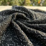 Premium black sleeveless top with silver bead embellishments and jagged leaf hem (3)