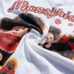 Woman wearing a white women's oversized t shirt with a vintage character print (1)