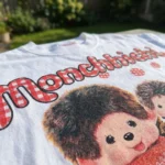 Woman wearing a white women's oversized t shirt with a vintage character print (2)