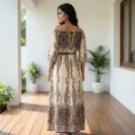 Woman wearing beige off shoulder paisley maxi dress with tie belt (4)