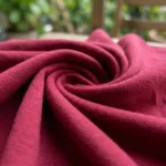 Women wearing a maroon button down A line midi dress (4)