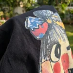 Women's black oversized t shirt with colourful graphic print (2)