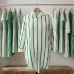 a premium women's white linen long shirt dress with bold green vertical stripes, (5)