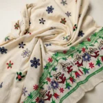 an off white women's co ord set with scattered floral patterns and detailed hem borders (1)