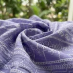 oman wearing a premium lavender embroidered long sleeve shirt (1)