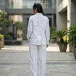 woman wearing white geometric patterned co ord set (3)