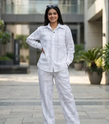 woman wearing white geometric patterned co ord set (6)